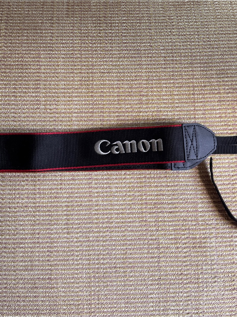 Canon Black Neck Strap with Red Trim and White Logo
